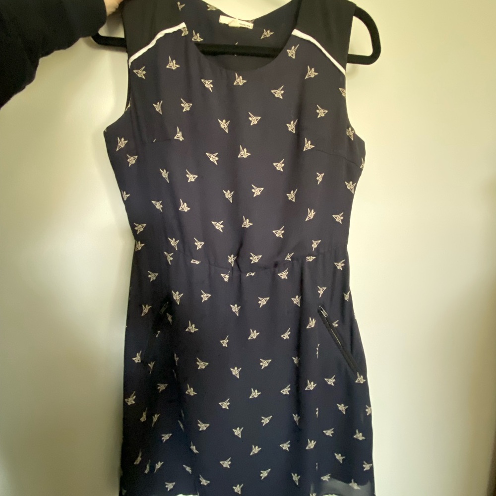 Origami bird dress with pockets